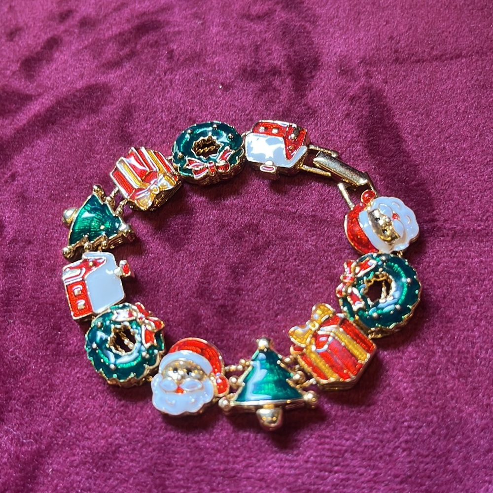 Avon Christmas Slide Charm Bracelet.